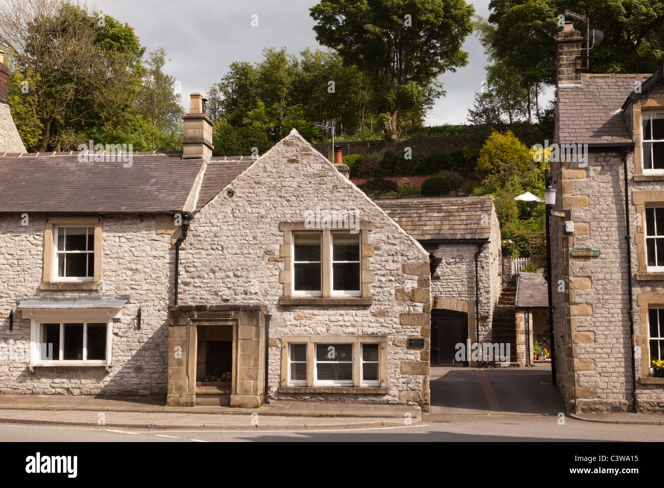 Cottages in Tideswell a village in Derbyshire,famous for its 14th-century parish church,the 'Cathedral of the Peak' Stock Photo