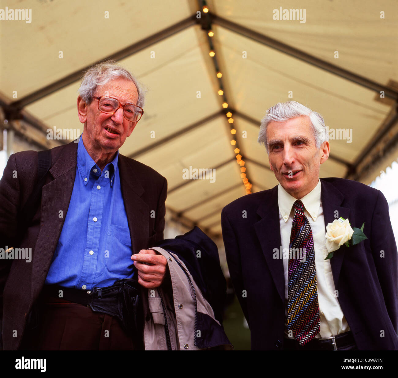 Eric Hobsbawm historian l. and Astronomer Royal Sir Martin Rees r. at the 2003 Hay Literature Festival in Hay-on-Wye Wales UK KATHY DEWITT Stock Photo