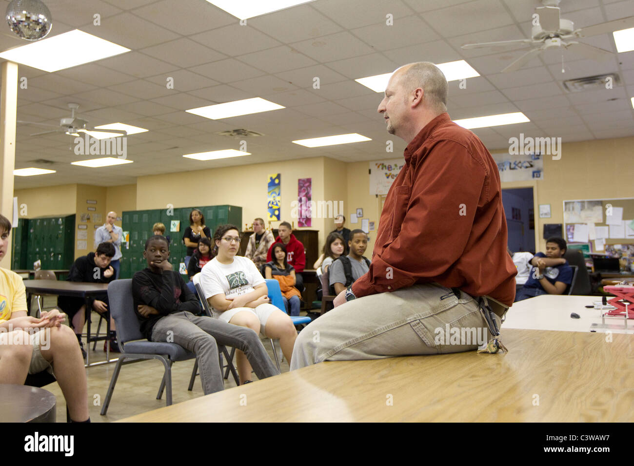Anglo male teacher talks to students during class at Rapoport Academy , a public charter school in Waco Texas Stock Photo