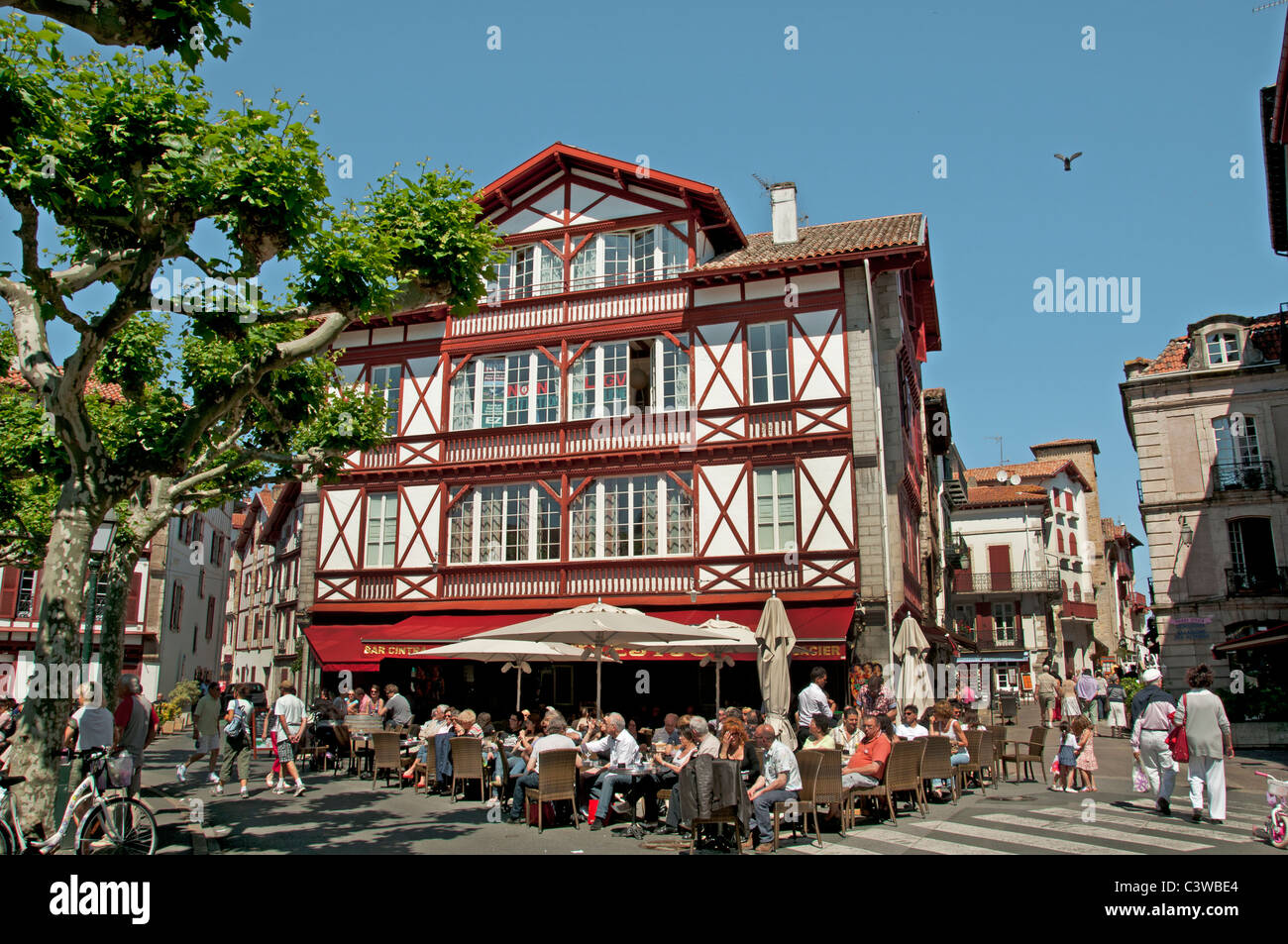 Place Loui XIV France St Jean de Luz Restaurant Bar Pub Pavement a typical fishing village Stock Photo