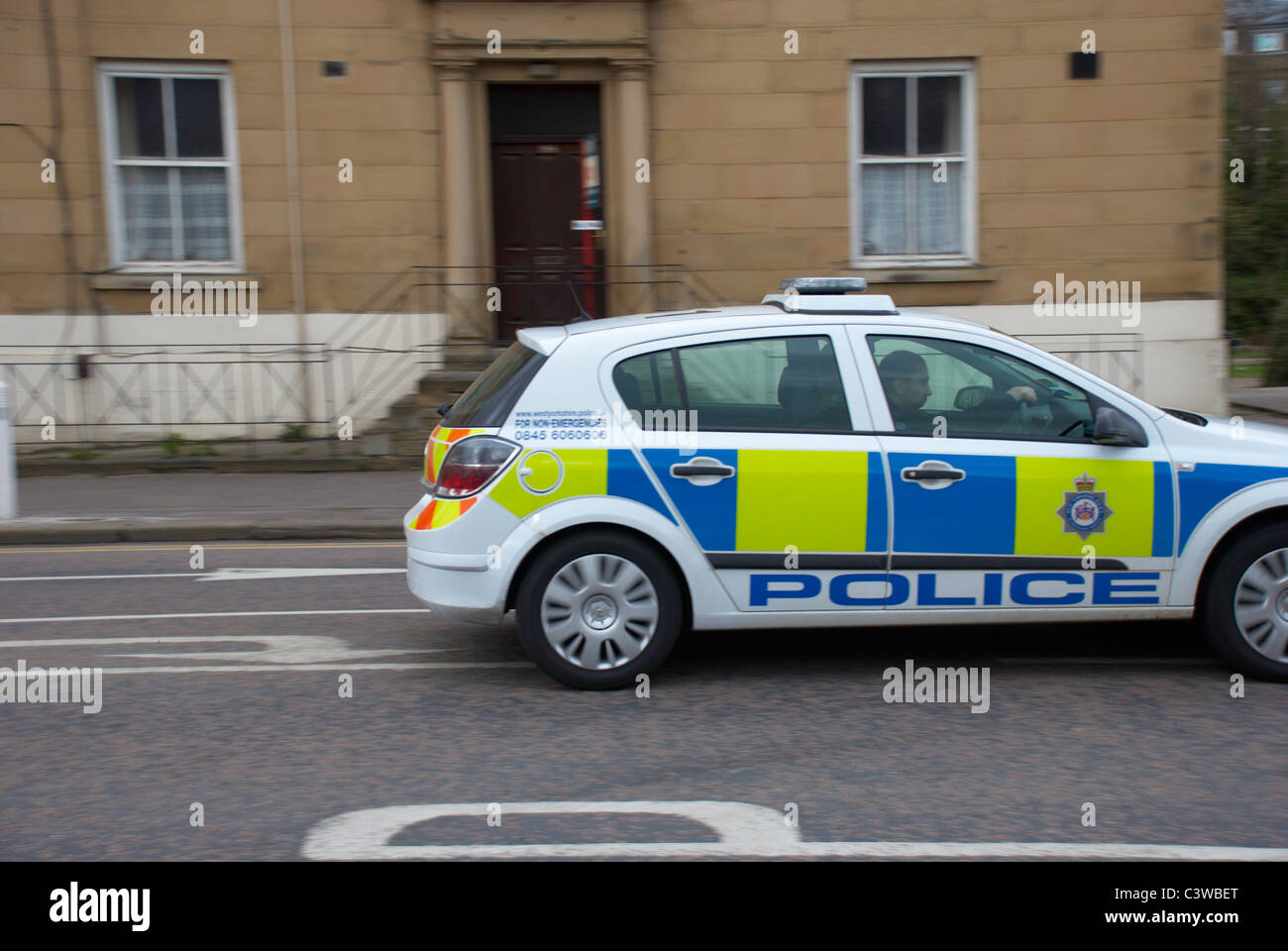 Police car heading towards Huddersfield (in Lockwood). Stock Photo