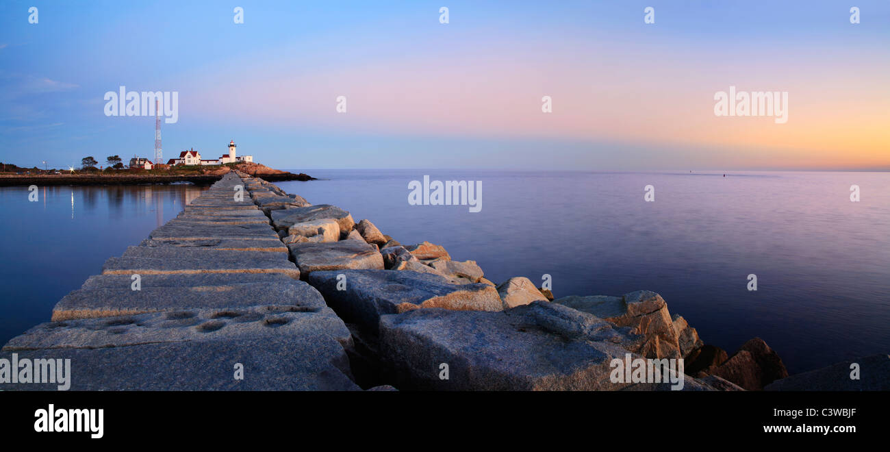 The Eastern Point Lighthouse And Dog Bar Breakwater At Sunset, Gloucester, Massachusetts, USA