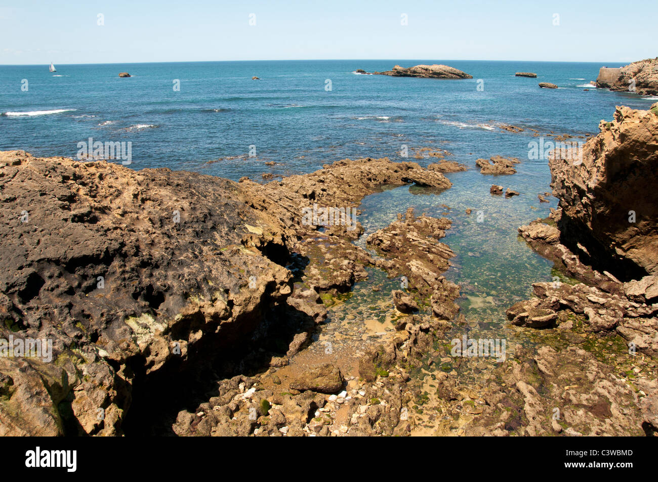 France French Biarritz old Harbor Rocks Sea The Plage du Port-Vieux Pyrenees Atlantiques Aquitaines flood tide ebb flow Stock Photo