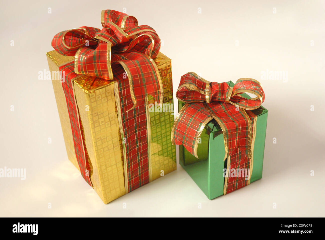 Golden Ribbon Packing Gift boxes with red and golden ribbons Stock Photo - Alamy
