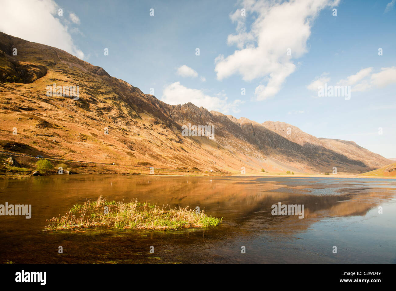 Looking up towards the Aonach Eagach a famous mountain ridge in glen ...