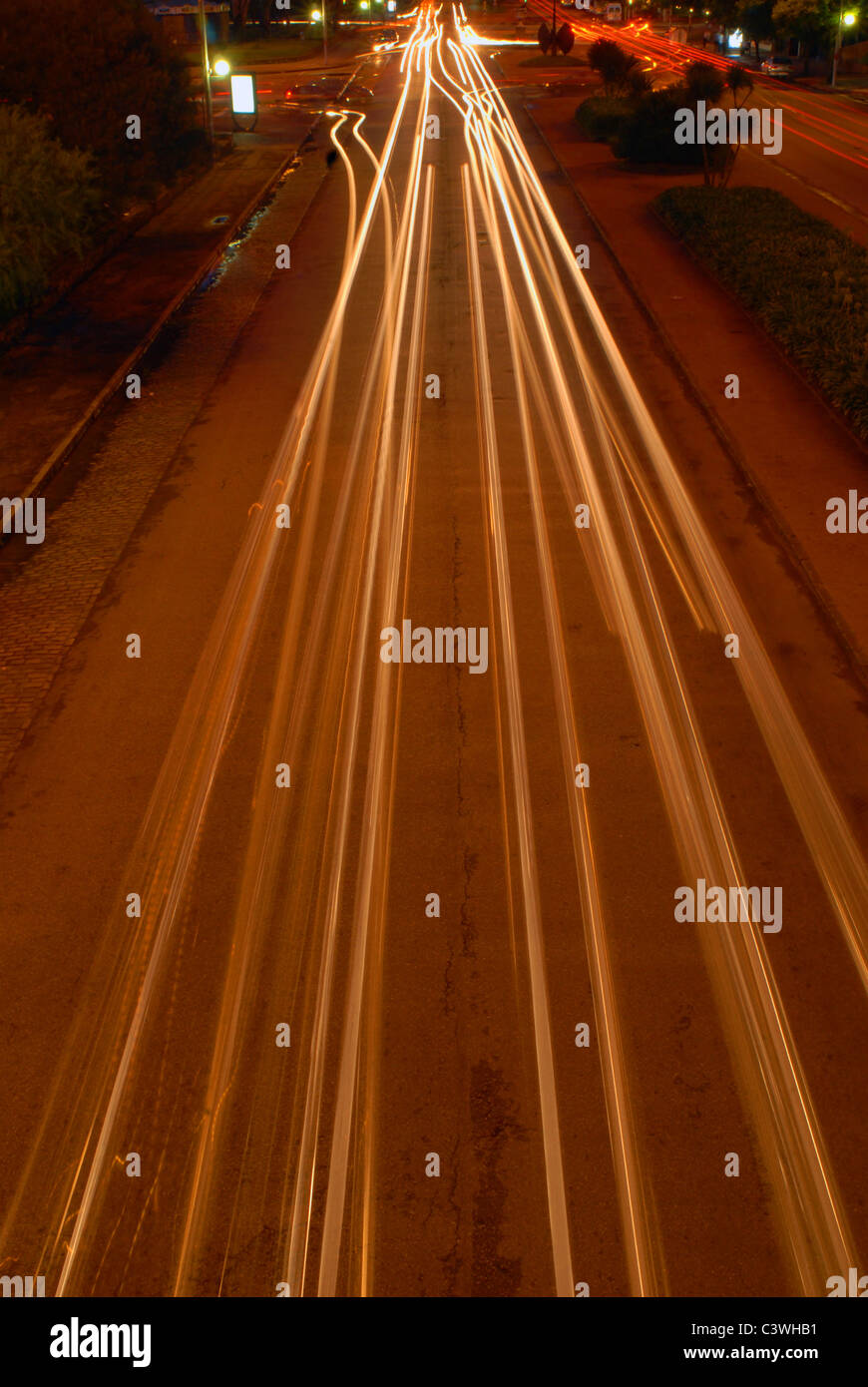 Cityscape of light lines at night traffic. Montevideo city, Uruguay. Stock Photo