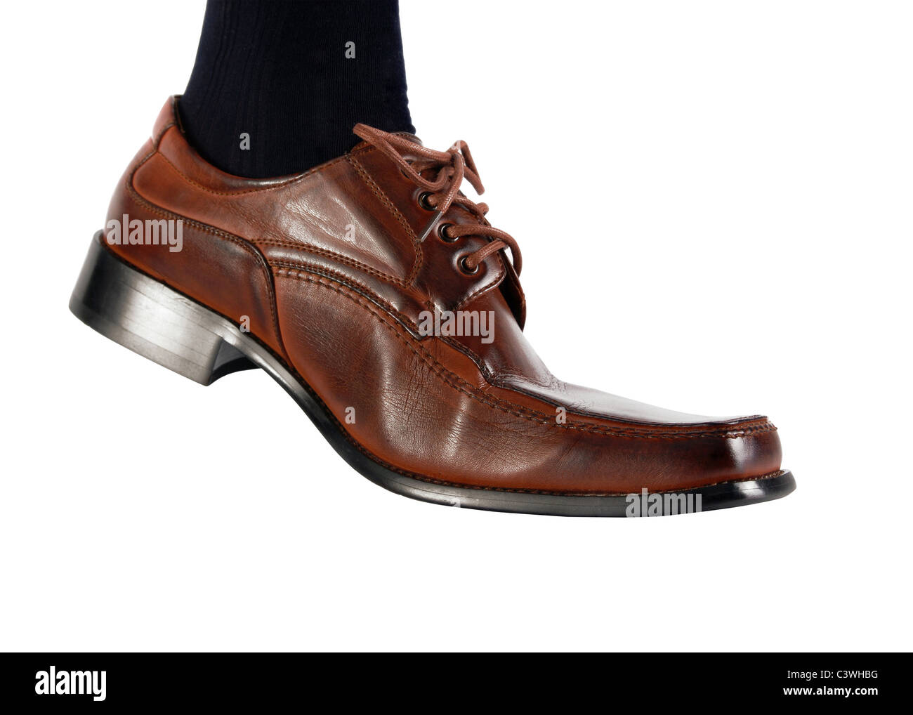 Male foot in brown shoe and black socks walking on white background Stock Photo Alamy