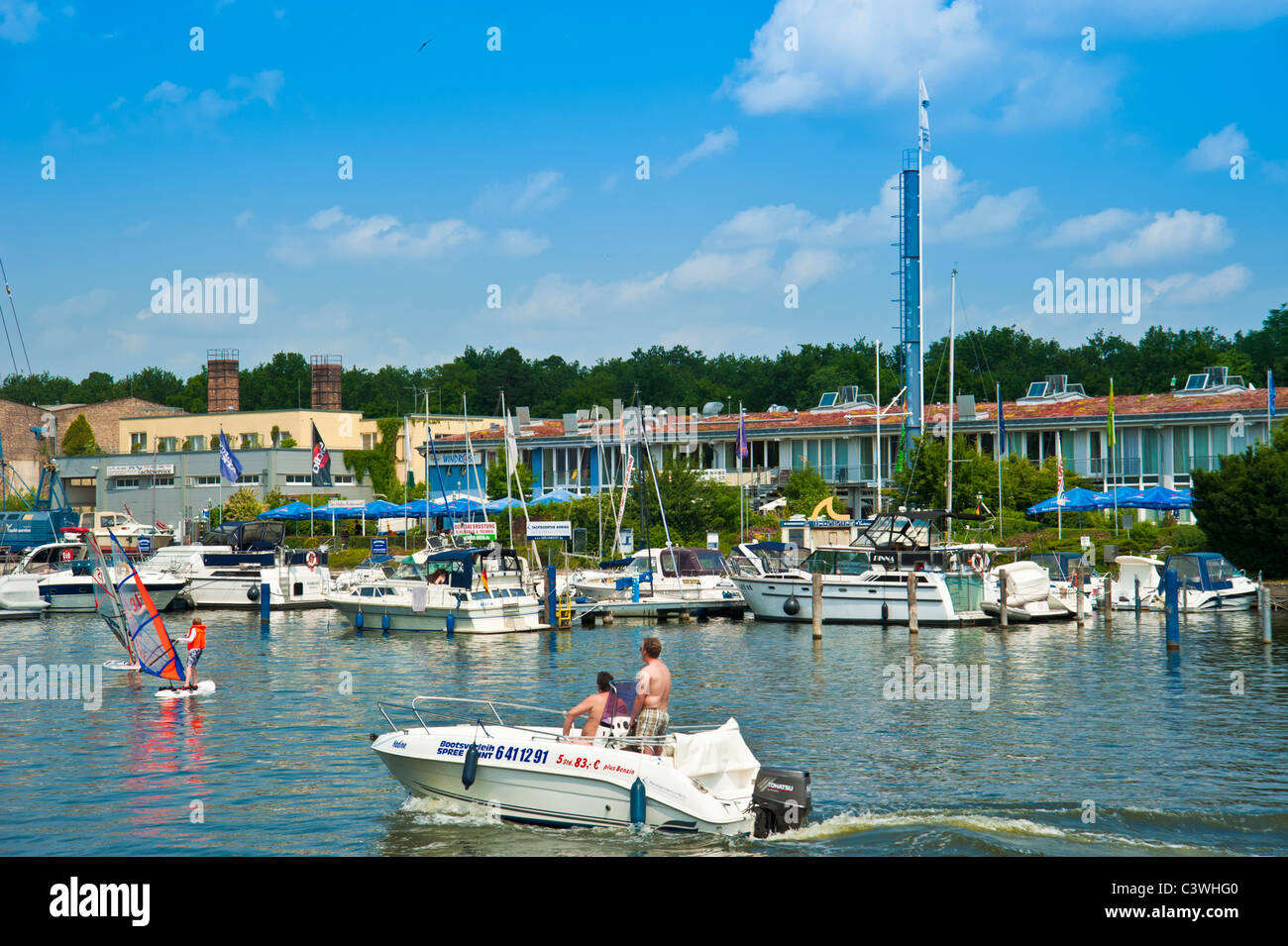 Power boat in front of marina Wassersportzentrum Berlin, River Spree, Berlin, Germany Stock Photo