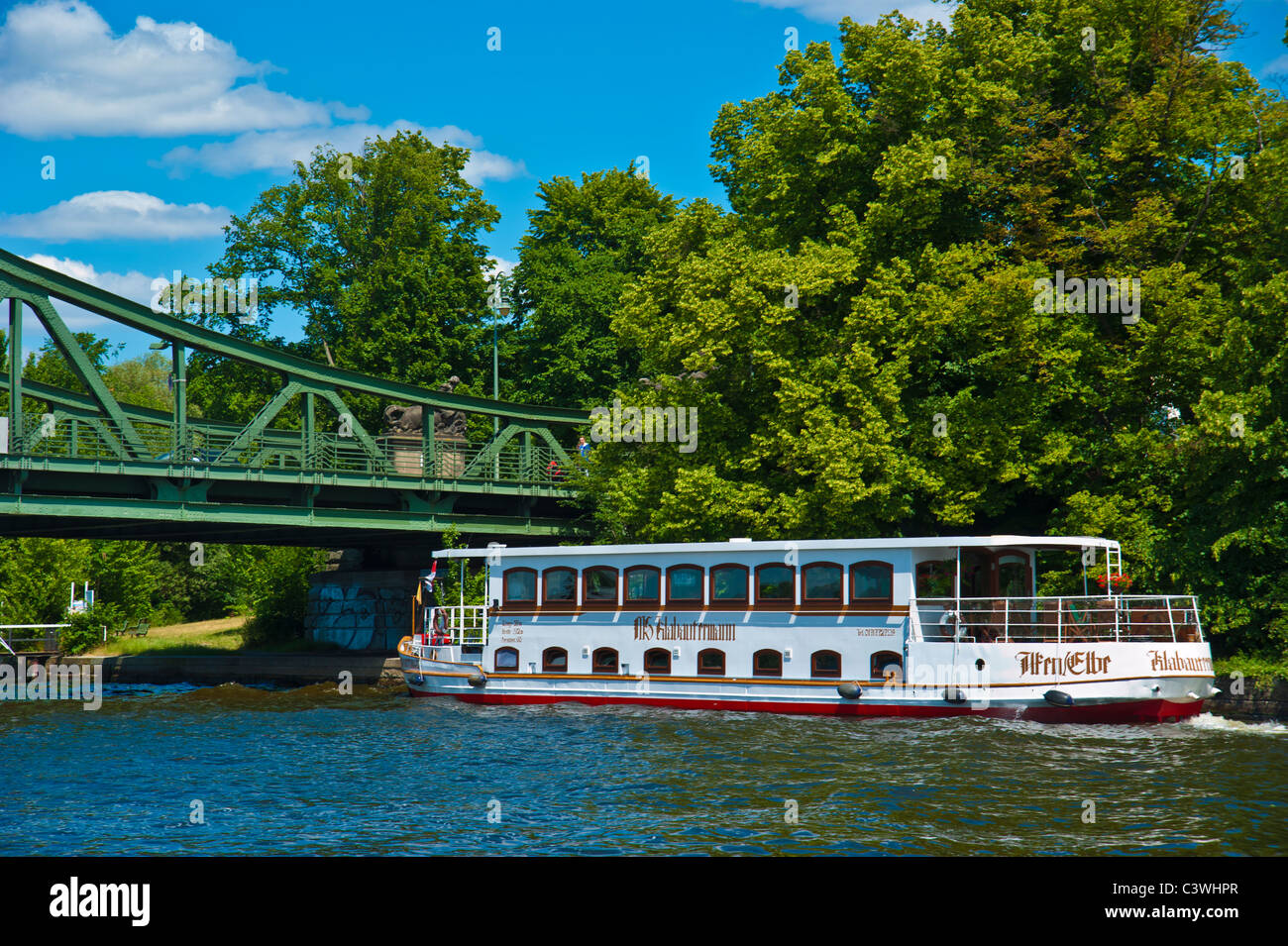 Tourist boat waiting at Glienicker Bridge over Havel, Potsdam, Berlin, Brandenburg, Germany Stock Photo