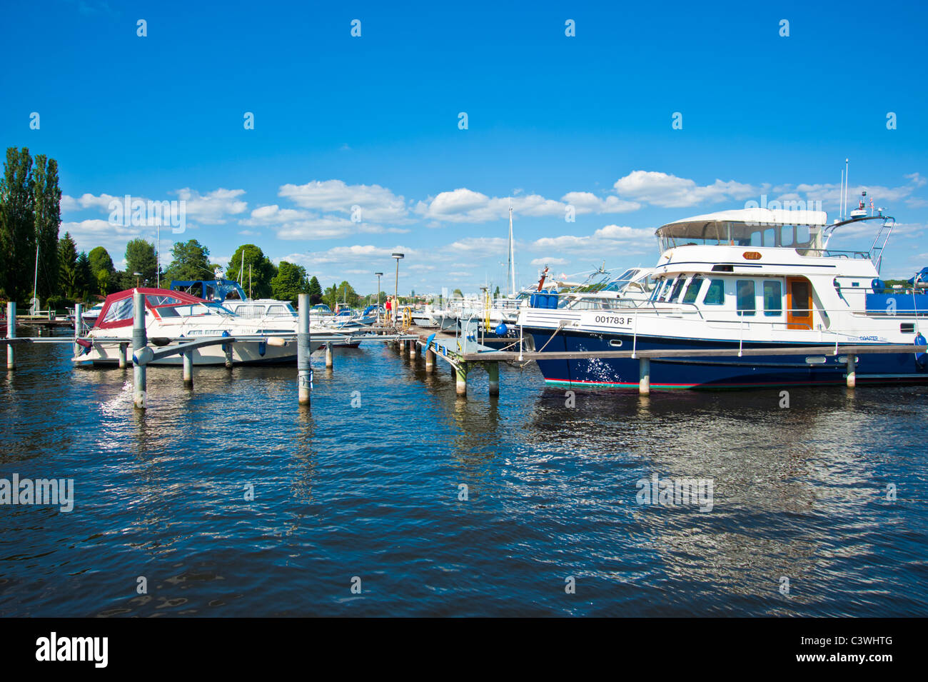 Yachts at landing stages at Marina Lanke, harbor, Berlin, Brandenburg, Germany Stock Photo