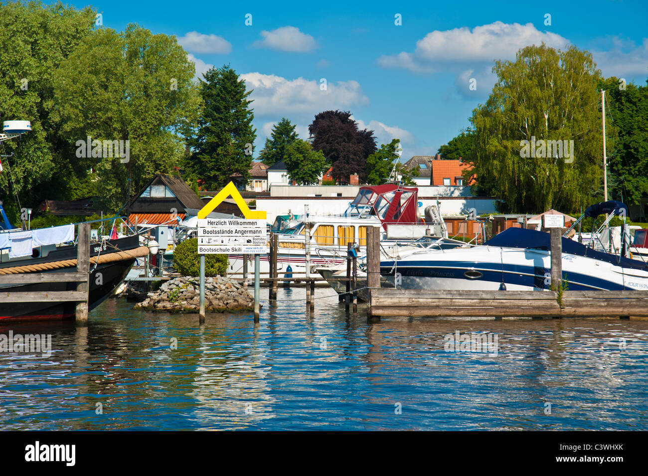Yachts at landing stages at Marina Angermann, harbor, Berlin, Brandenburg, Germany Stock Photo