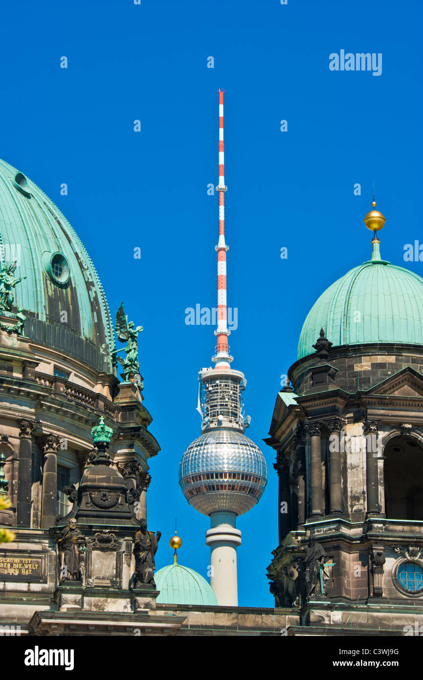 Architecture contrast - Berliner Dom, cathedral, and Alex, TV-Tower - Berlin, Germany Stock Photo