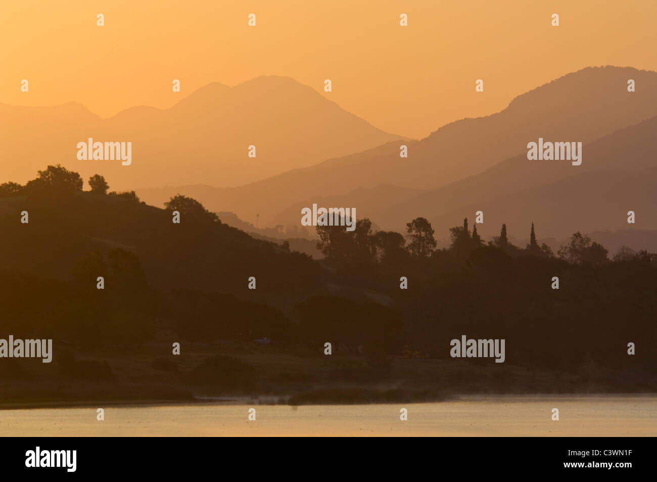 Morning sunrise light over Lake Casitas and rolling hills near Ojai, California Stock Photo