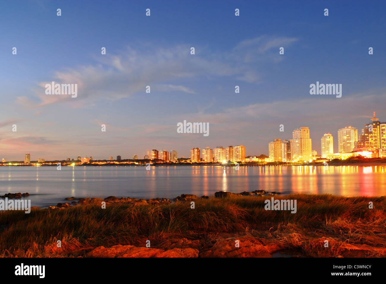 Golden sunset at Punta del Este seashore city. Uruguay. Stock Photo