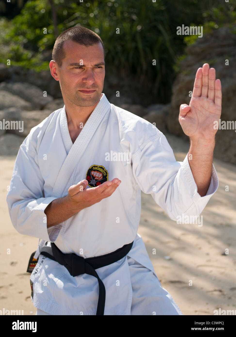 Karate training on the beach in Okinawa Japan the birthplace of karate Stock Photo