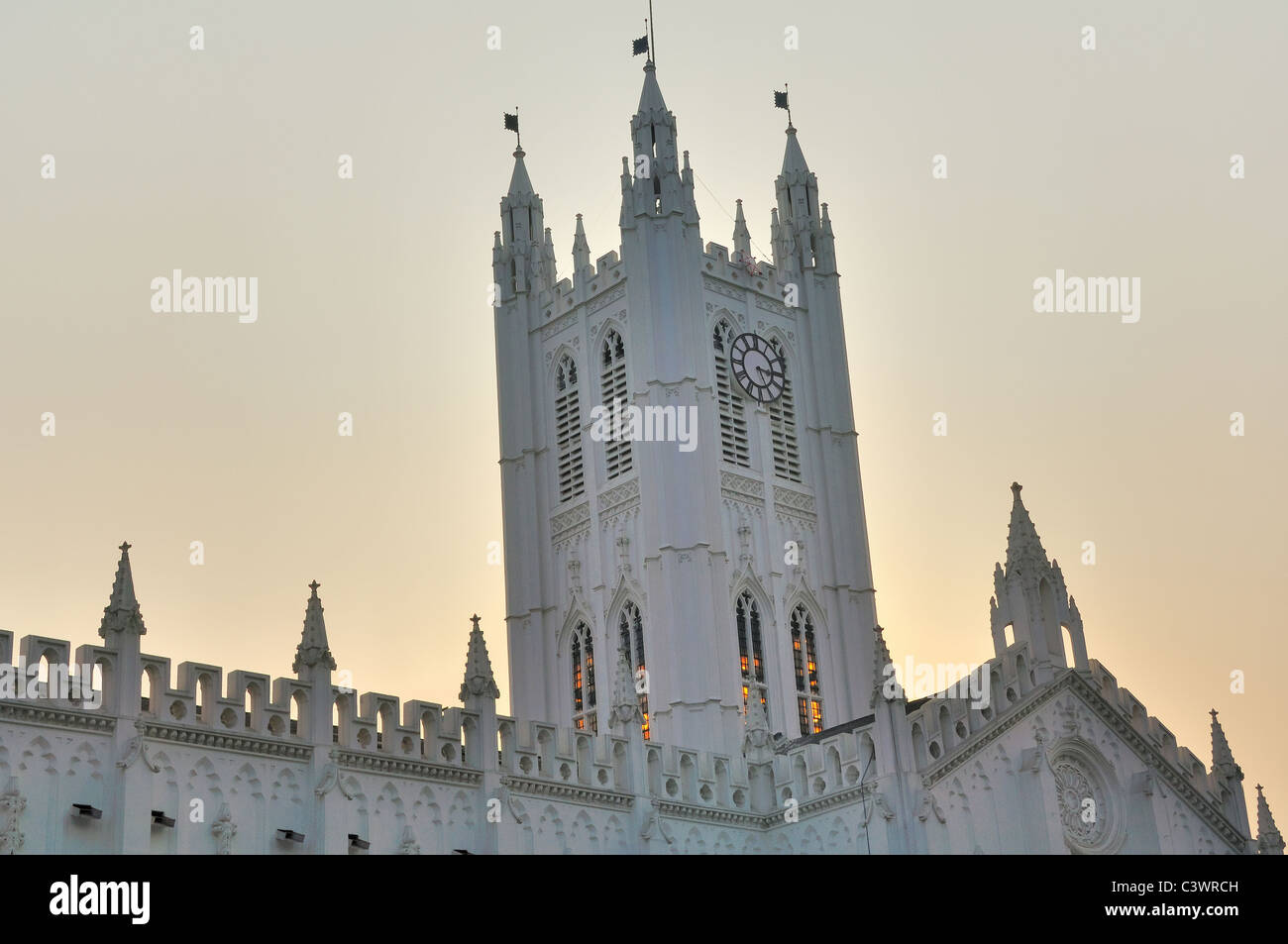 The Clock Tower of St. Paul's Cathedral, Calcutta during dusk Stock Photo