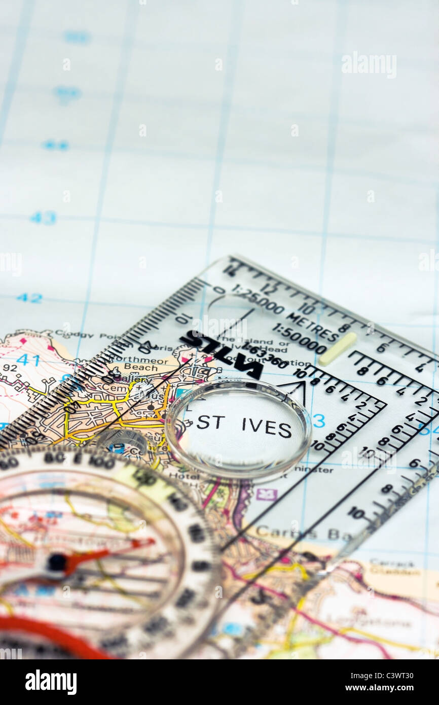 Close up view of a map with a compass magnifying the Cornish resort of St Ives Stock Photo