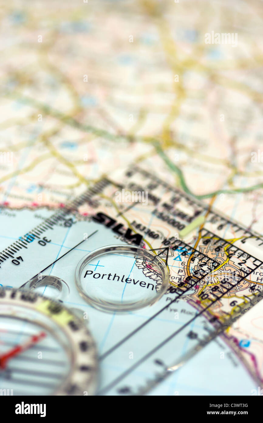 Close up view of a map with a compass magnifying the Cornish resort of Porthleven Stock Photo