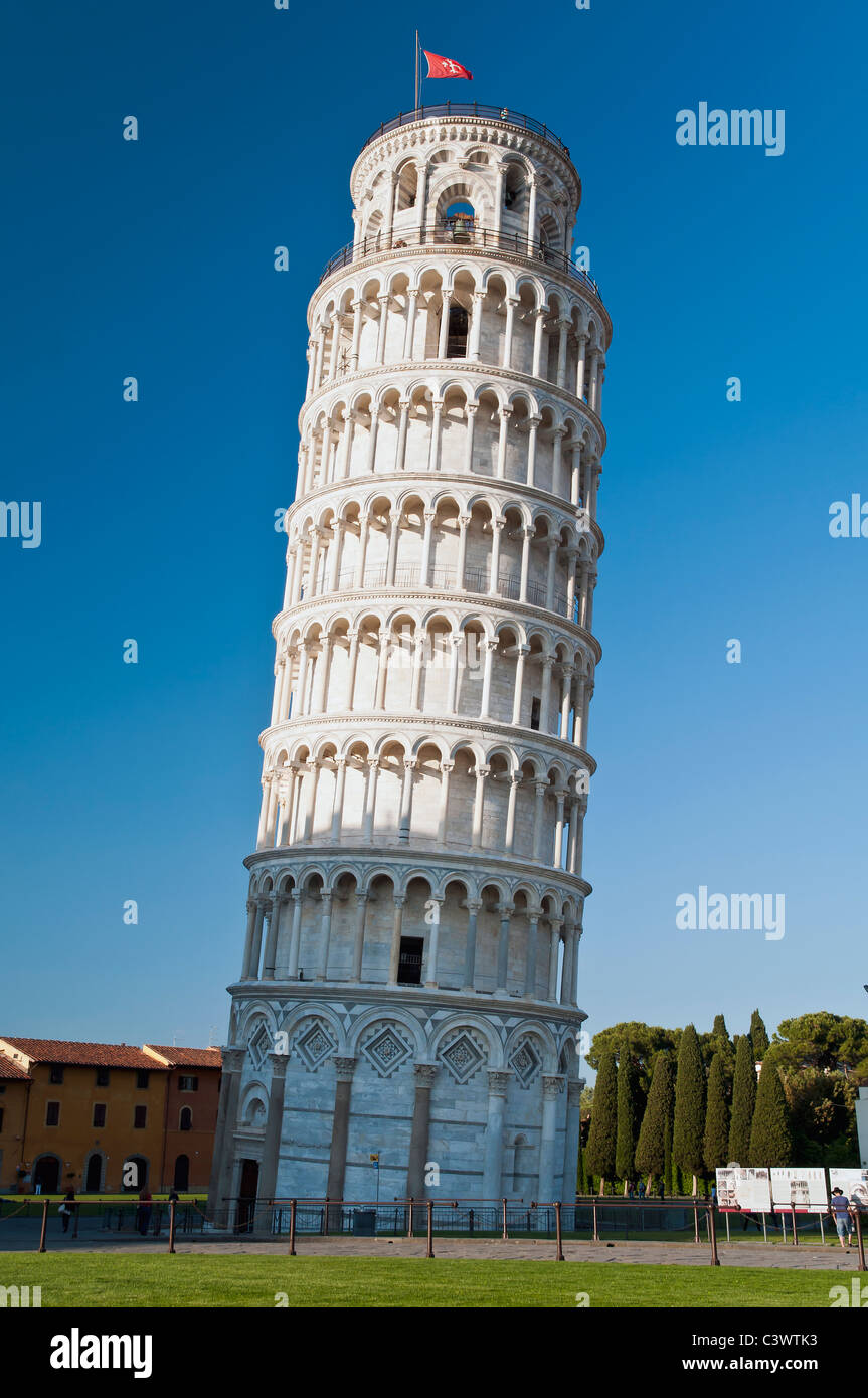The worldwide famous Leaning Tower standing out against the sky at sunset, Pisa, Tuscany, Italy Stock Photo