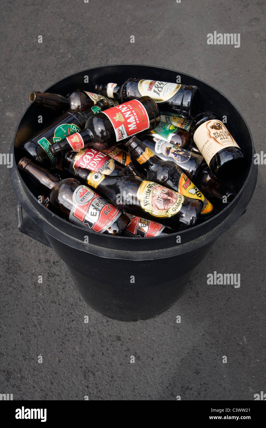 Beer bottles in bin ready to go for recycling Stock Photo Alamy