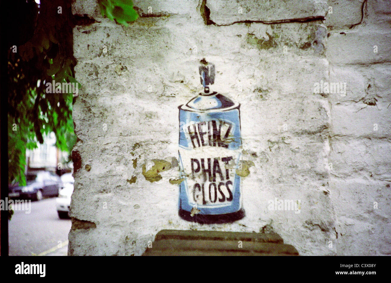 Colour grafitti stencil, Heinz Phat Gloss, on wall in Kensal Rise Stock Photo