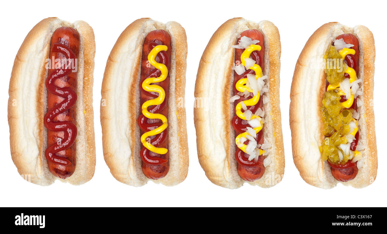 A collection of hotdogs with mustard, ketchup, relish and onions. Stock Photo