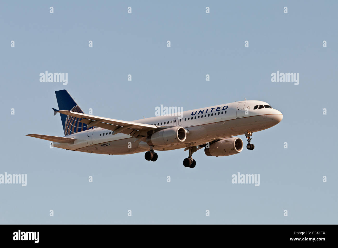 An Airbus A320 jet airliner belonging to United Continental Holdings, inc and painted in the airlines new UNITED livery. Stock Photo
