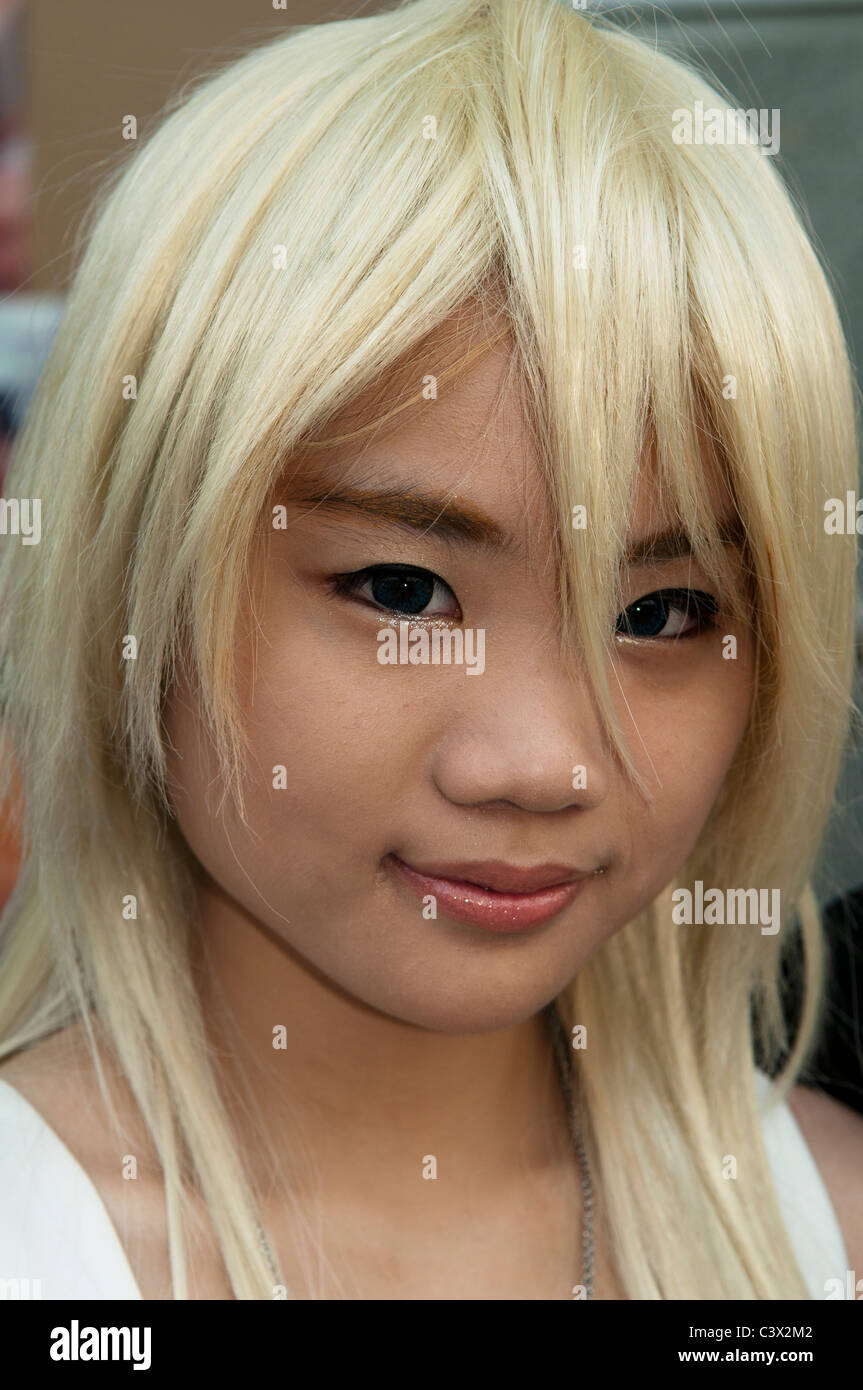 cute young blond Thai girl at Cosplay Festival in Bangkok Stock Photo