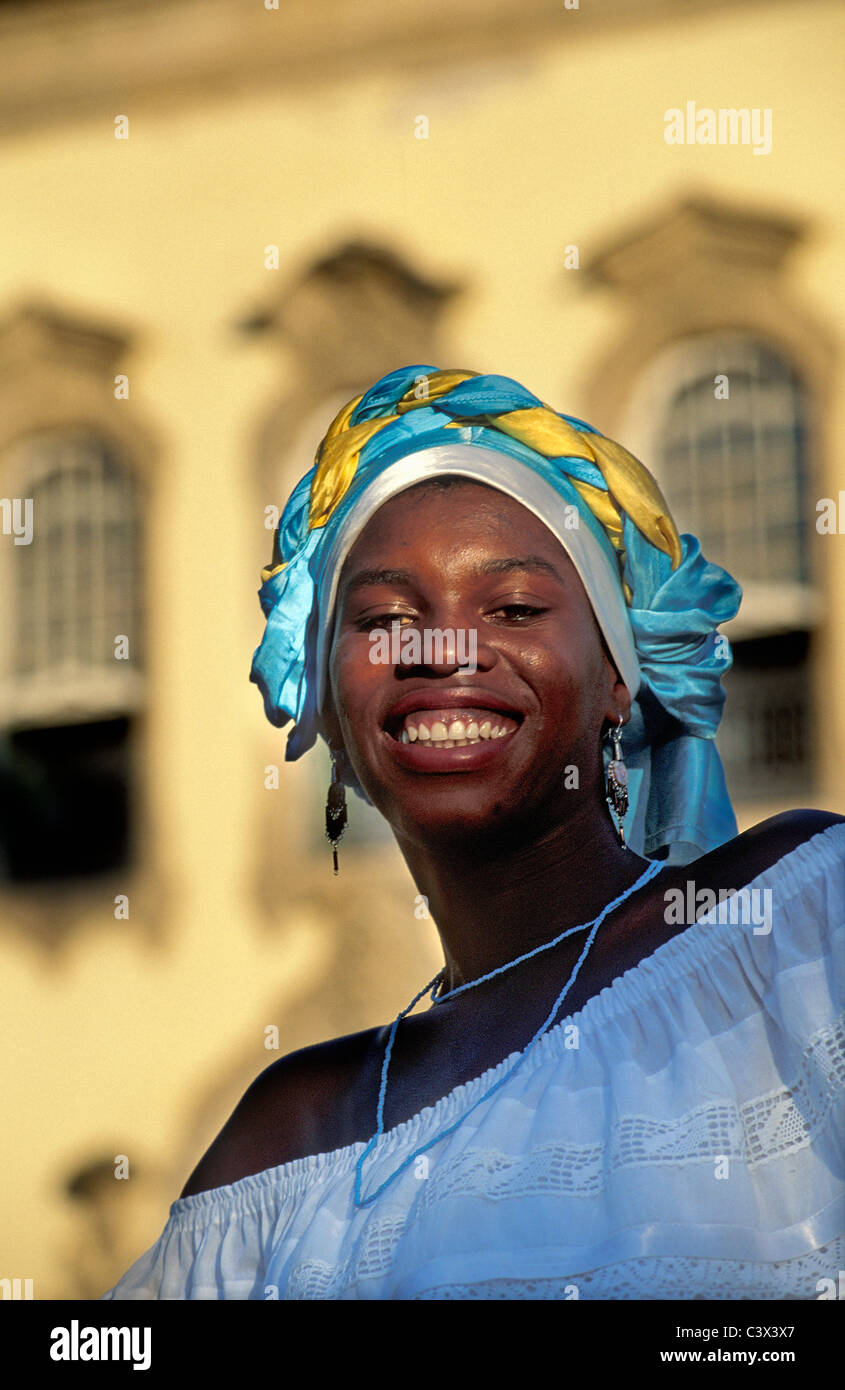 Brazil, Salvador de Bahia, Woman in front of cathedral. Stock Photo