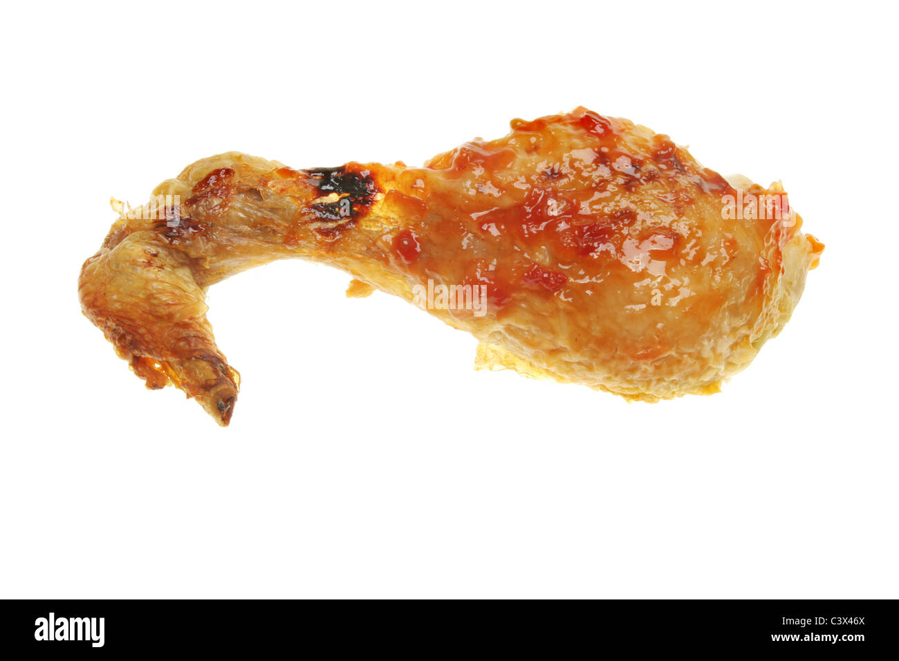 Barbecued chicken drumstick isolated against white Stock Photo