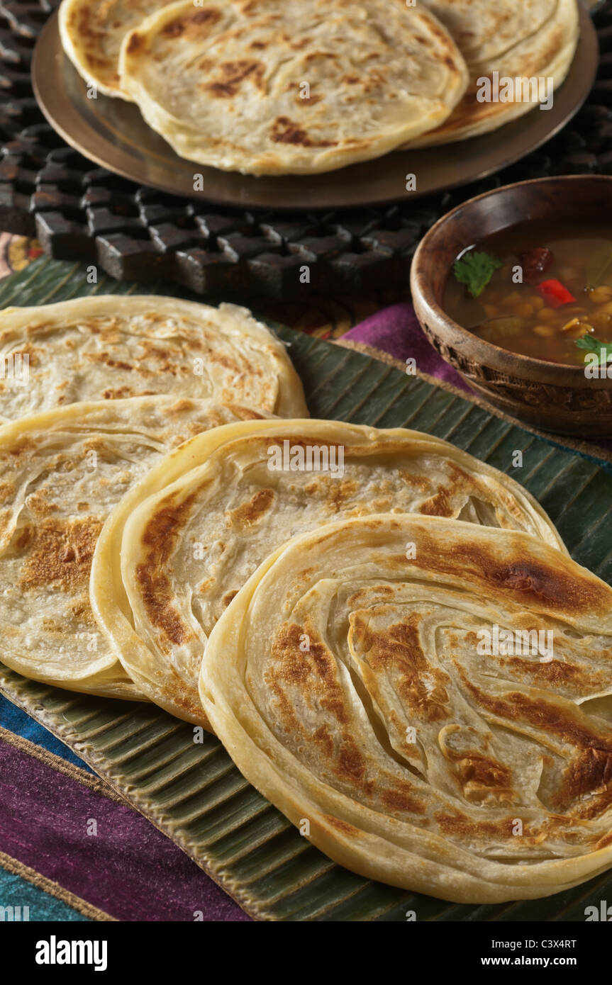Parathas on banana leaf Indian flat bread Stock Photo