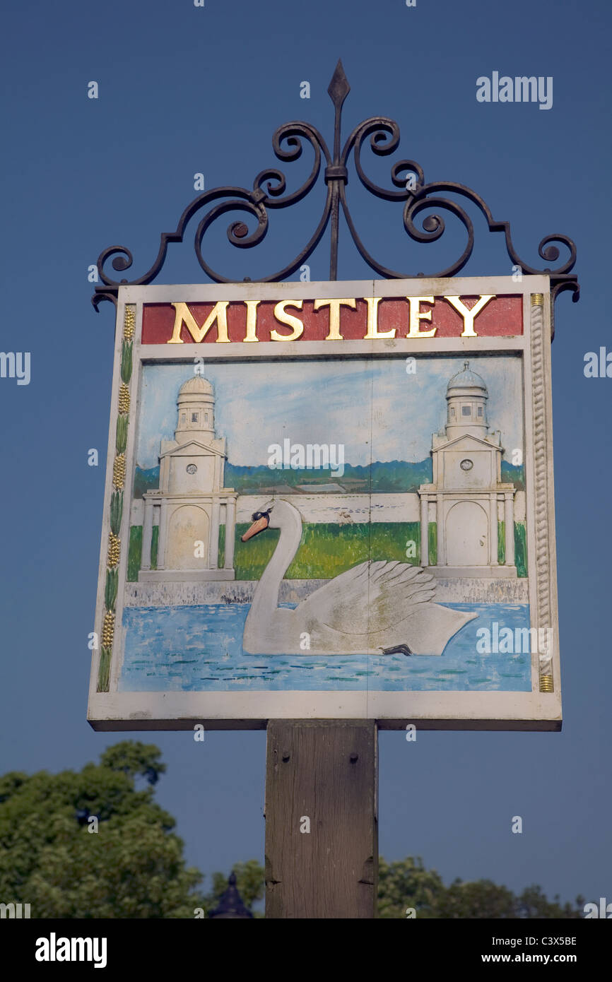 Mistley village sign showing swan and towers Essex England Stock Photo