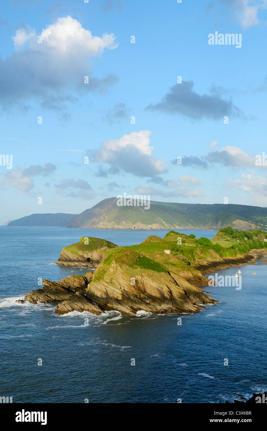 Sextons Burrow near Combe Martin viewed from Widmouth Head. Devon, England. The cliffs of Exmoor can be seen in the distance. Stock Photo