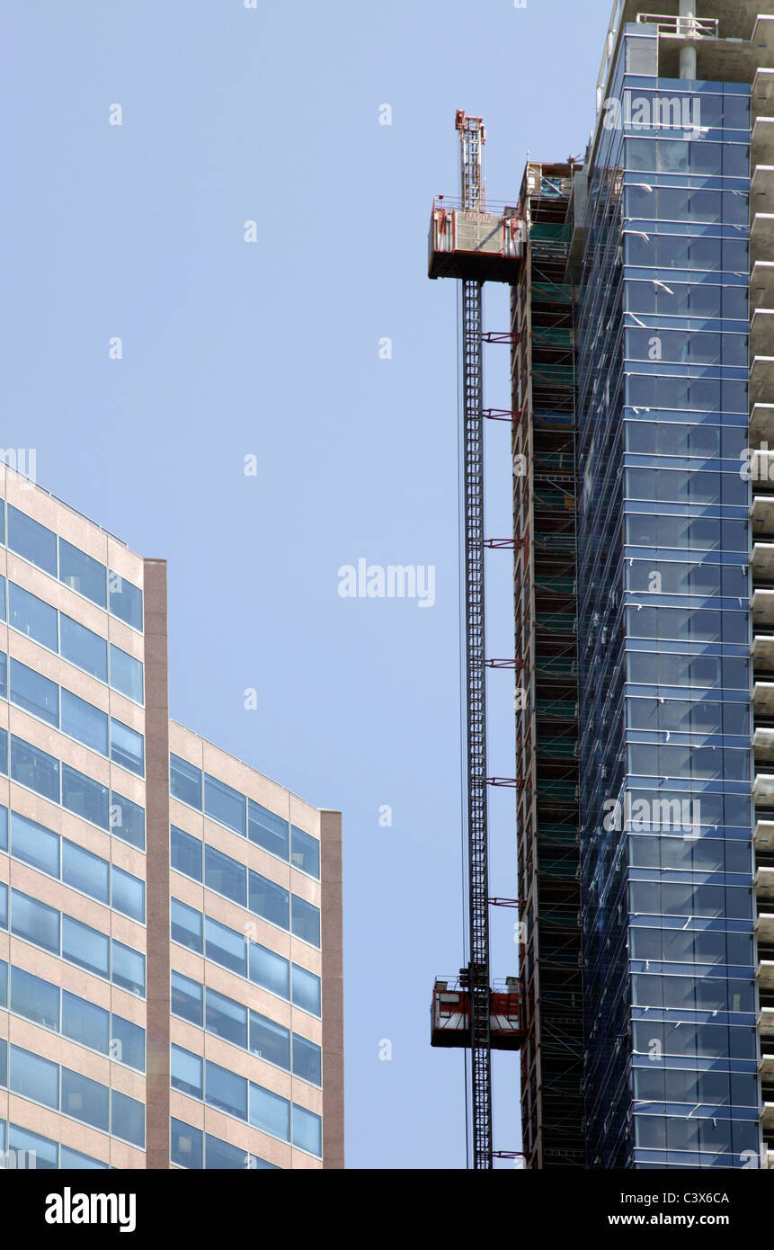 Construction elevator by new building Stock Photo