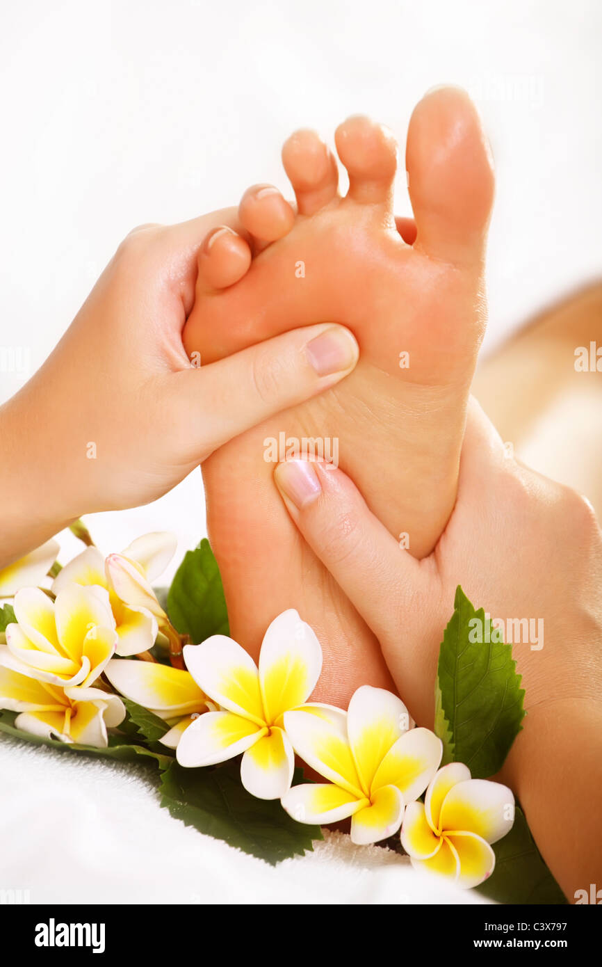 Foot massage and spa foot treatment. Stock Photo