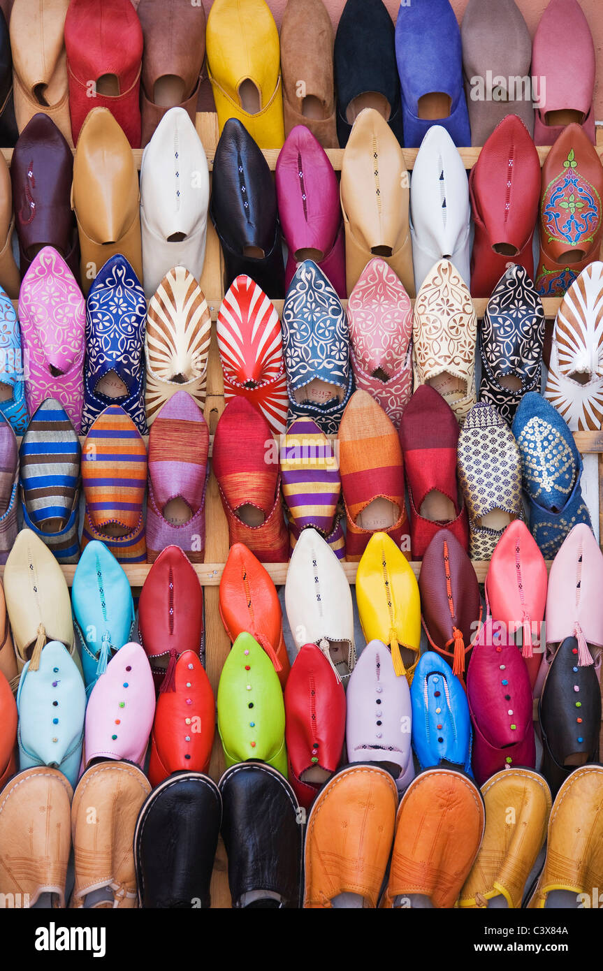 Displayed shoes in a shop in the souks of Marrakesh. Morocco. Stock Photo