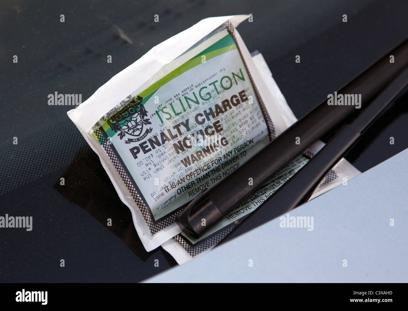 Parking ticket on car windscreen, London Stock Photo