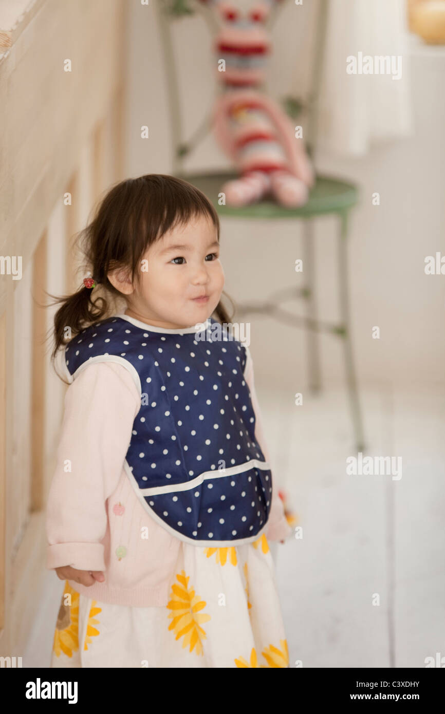 Baby Girl with Bib Stock Photo Alamy