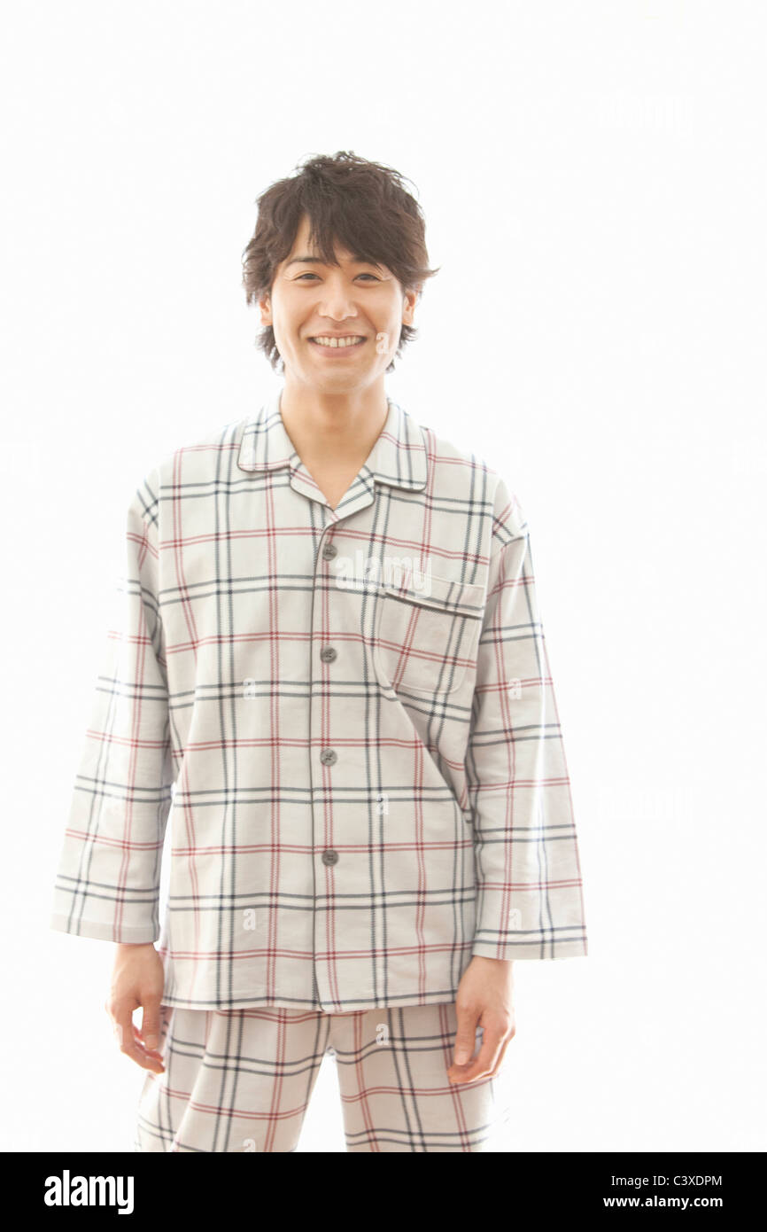 Young Man in Pajama Stock Photo