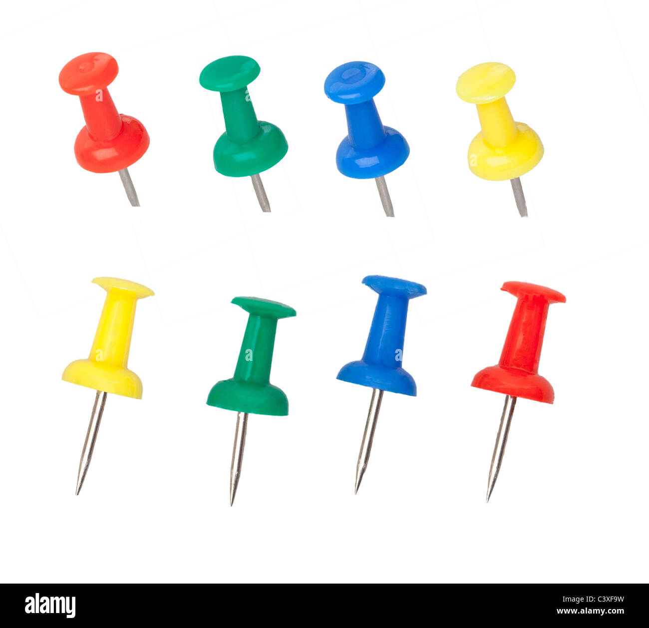 Various thumbtacks or pins isolated against a pure white background