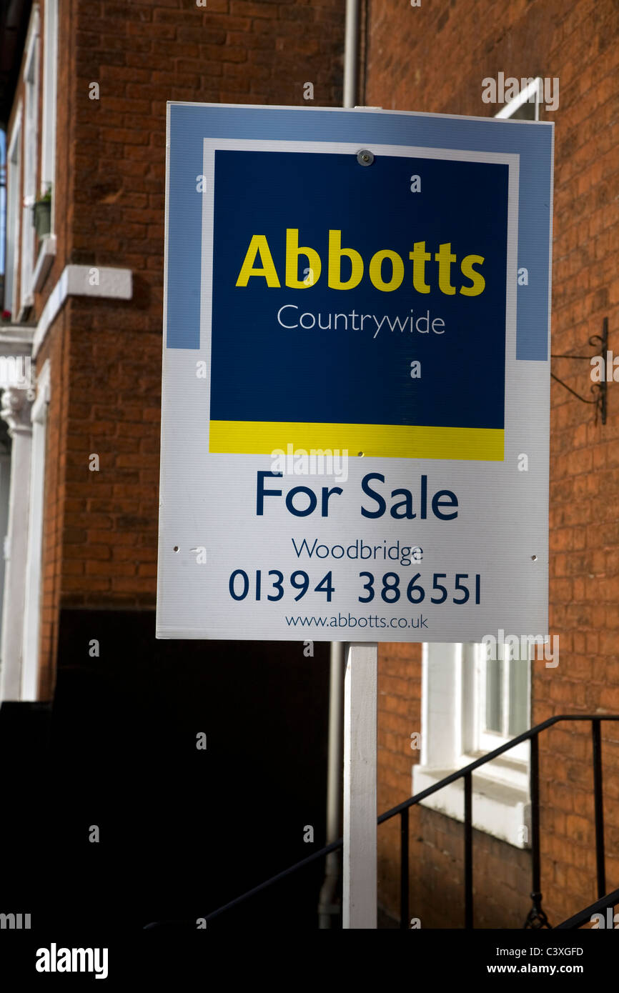 Abbotts estate agent for sale sign outside house Stock Photo Alamy