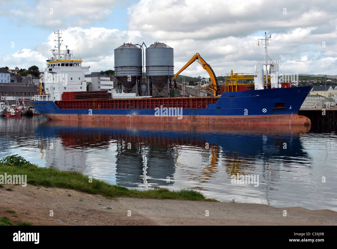 large cargo ship in wicklow port on the irish sea Stock Photo