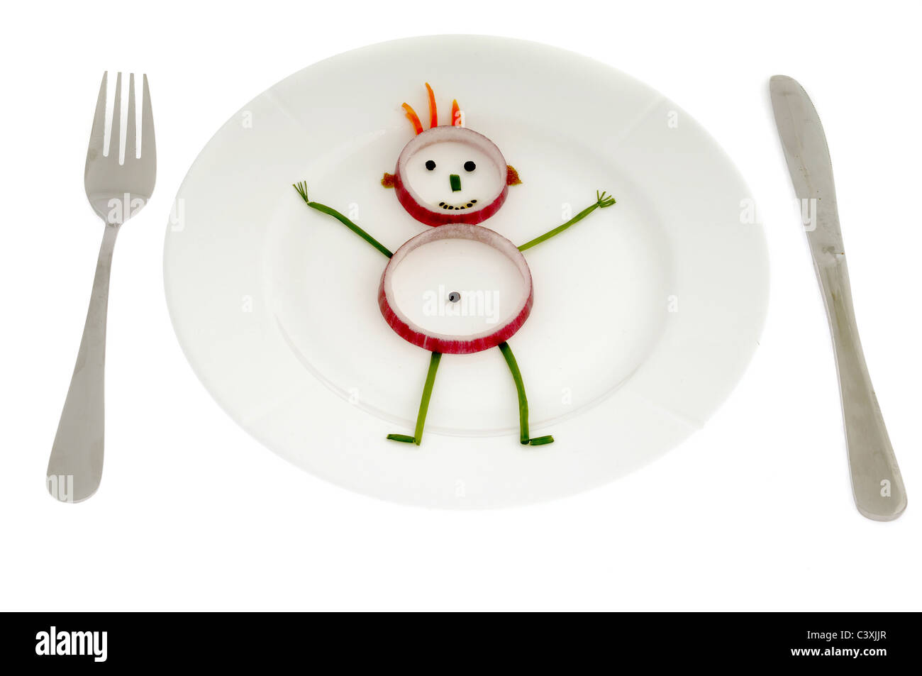 Man made of vegetables on a dish Stock Photo Alamy