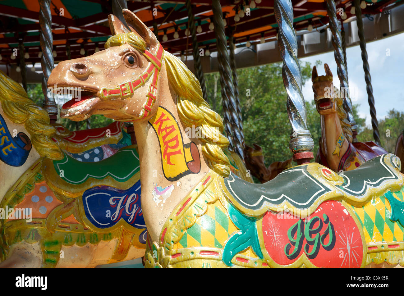 Gallopers Fairground Ride Wooden horses know as 'gallopers' on a traditional fair ground ride at ...