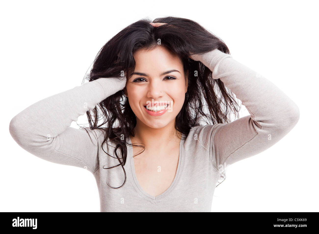 Portrait of a beautiful young woman smiling, isolated over white ...