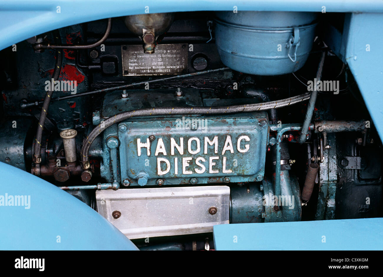 Engine of a vintage R45 Hanomag Diesel tractor in Bremerhaven in Germany. The R45 was built between 1950 and 1957. Stock Photo
