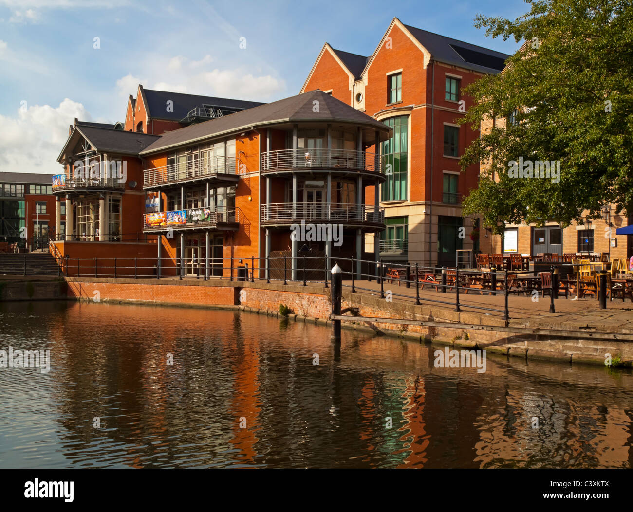Modern flats and restaurant next to Nottingham city centre canal England UK Stock Photo