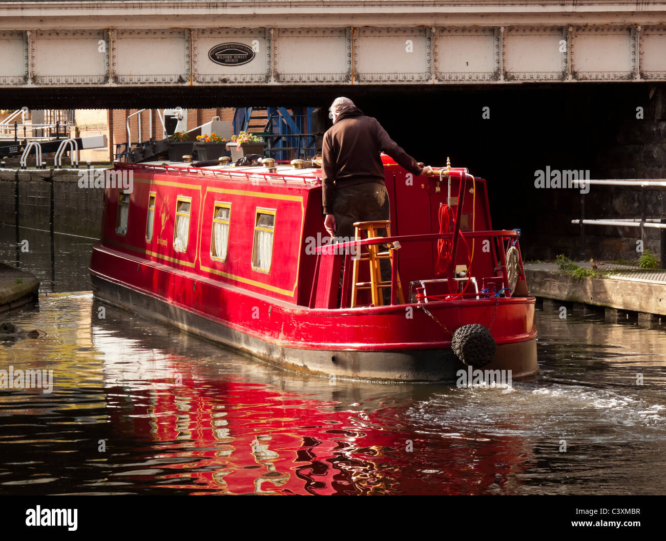 Red barge in Nottingham city centre canal England UK Stock Photo