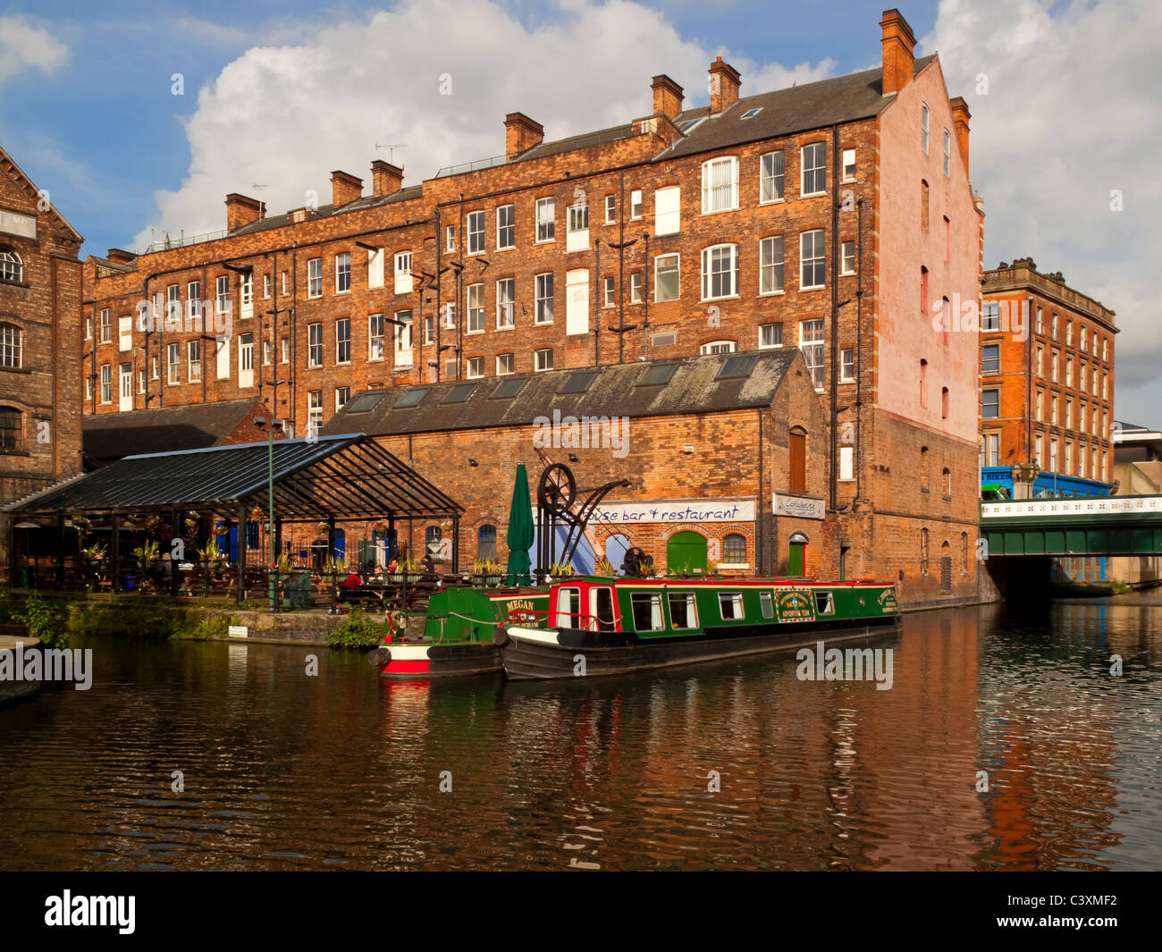 Green barge in Nottingham city centre canal England UK Stock Photo