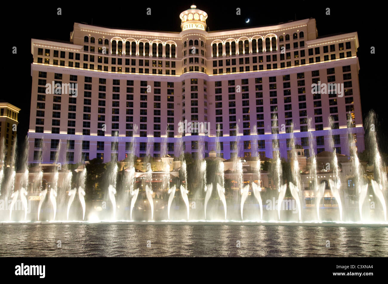 The Fountains of Bellagio show at night in front of the Bellagio Hotel
